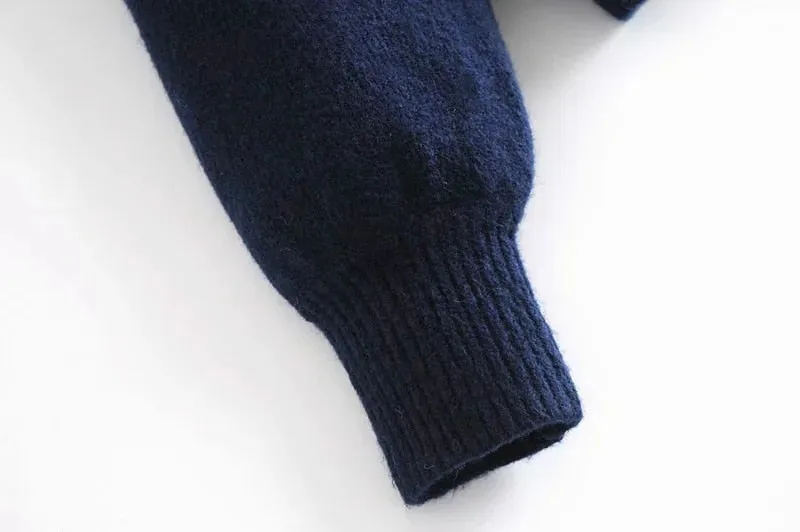 KNOT RIBBED TRIMS KNITTED SWEATER