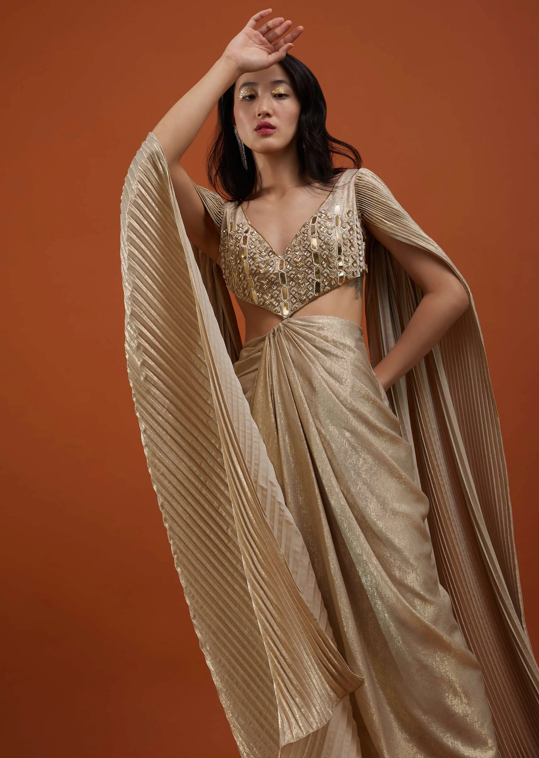 Mocha Brown Gown With A Pre-Pleated Dhoti Skirt And Royal Cape Sleeves - NOOR 2022