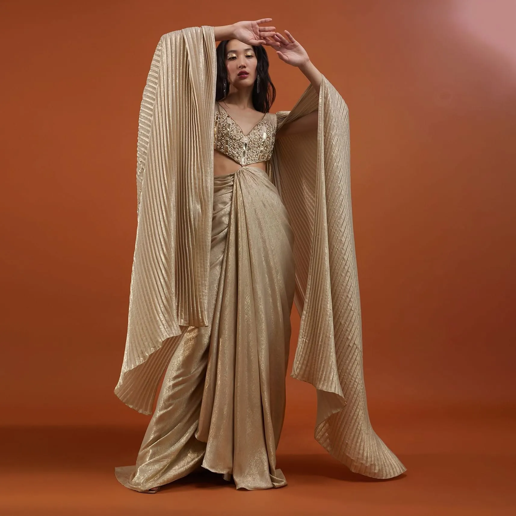Mocha Brown Gown With A Pre-Pleated Dhoti Skirt And Royal Cape Sleeves - NOOR 2022
