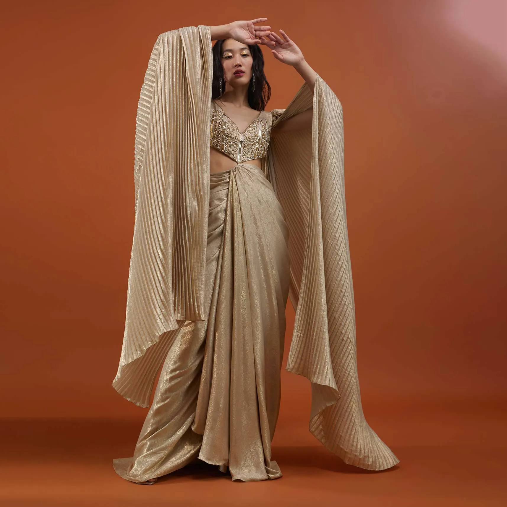 Mocha Brown Gown With A Pre-Pleated Dhoti Skirt Area And Royal Cape Sleeves- NOOR 2022